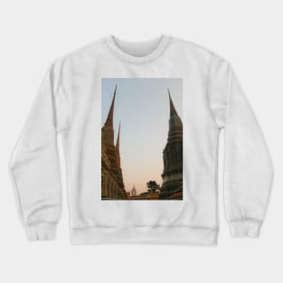 Second view of two stupa against sky at Wat Pho Crewneck Sweatshirt